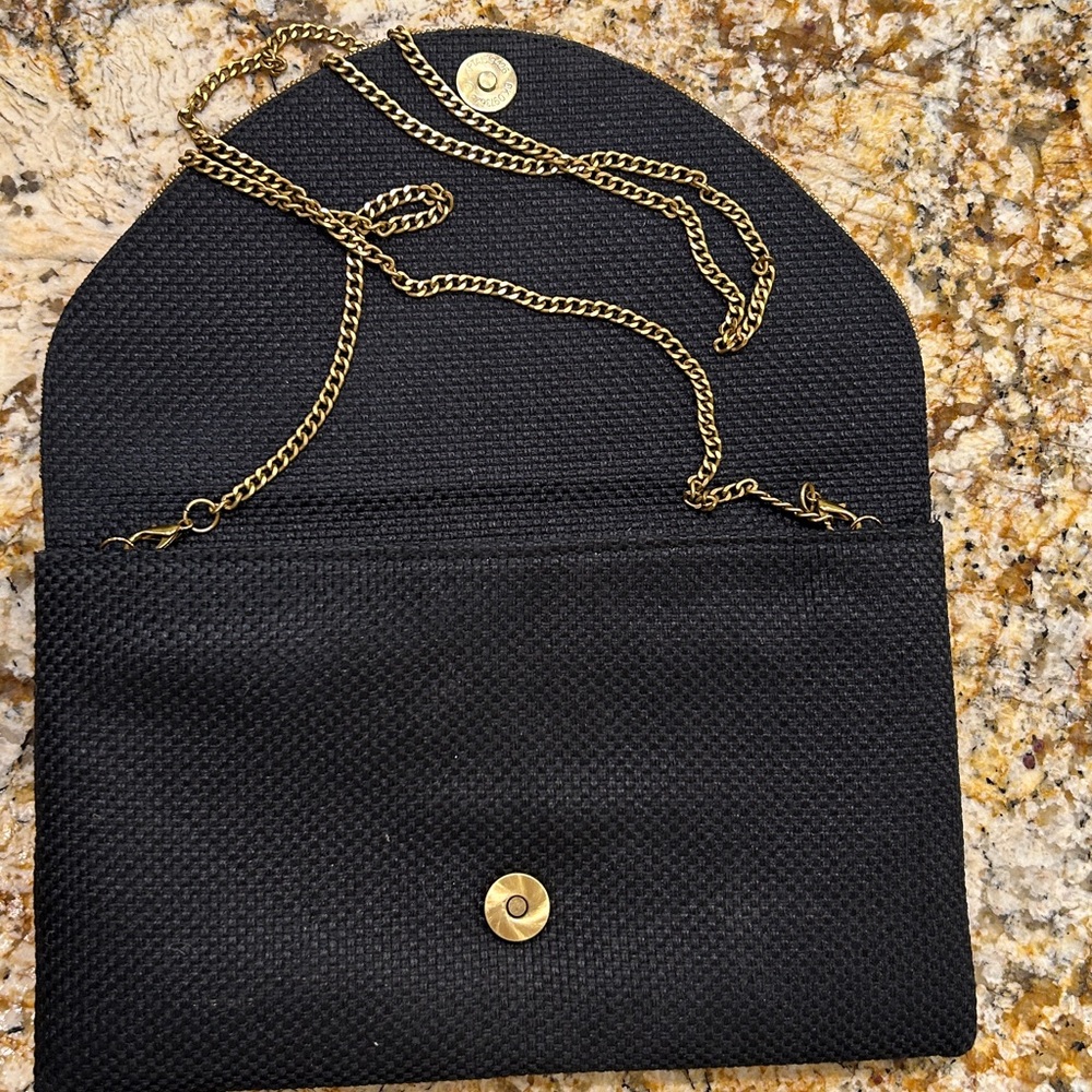 Beaded Black Clutch with Floral Design
David Jeffrey design - Picture 3 of 4